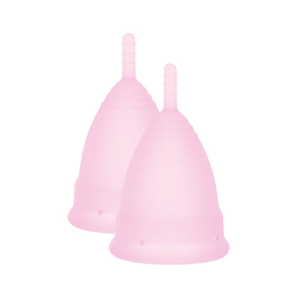 Two small menstrual cups for intimate health, likely silicone, in packaging by mae b.