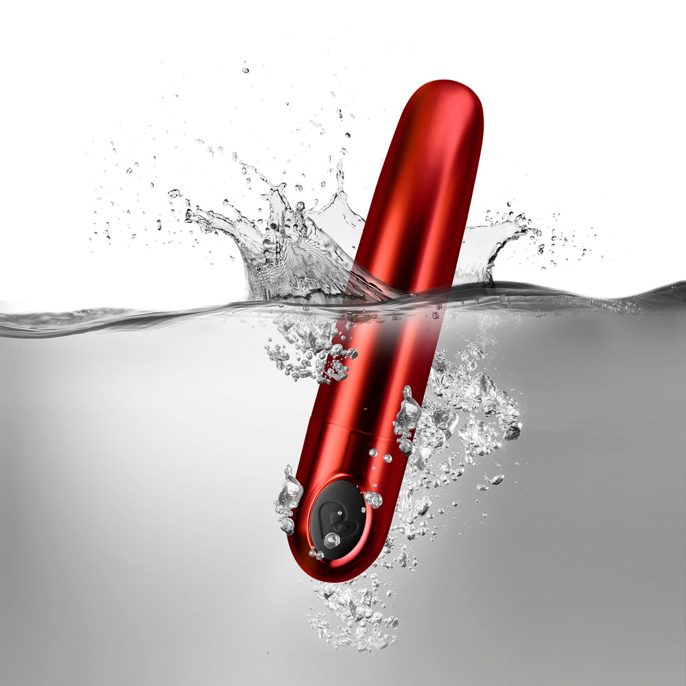 Ruby red rocks off caress vibrator with smooth finish for sensual pleasure.