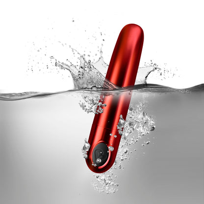 Ruby red rocks off caress vibrator with smooth finish for sensual pleasure.