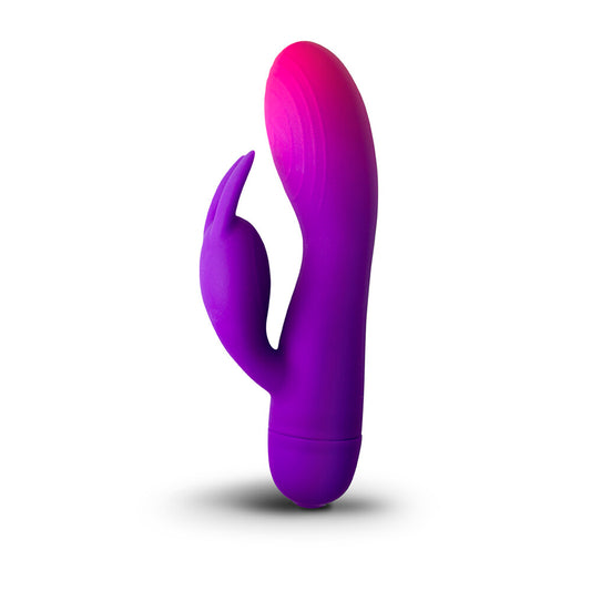 Glow-in-the-dark bunny vibrator, purple and pink, a fun and playful sex toy.