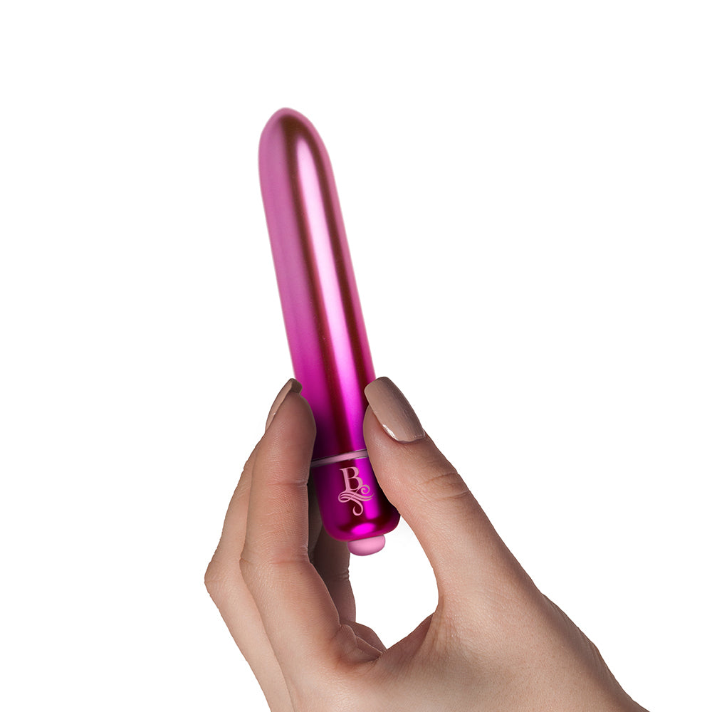 Close-up of a sleek, bullet-shaped vibrator in a boudoir style with a smooth finish.