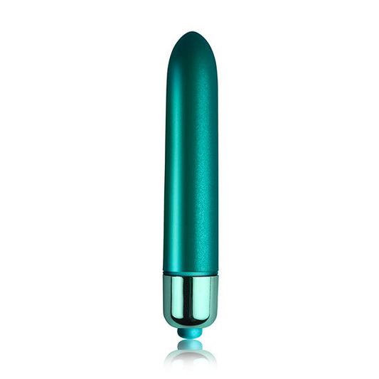 Close-up of a vibrating pleasure toy with layered velvet peacock feather petal design in deep purple.