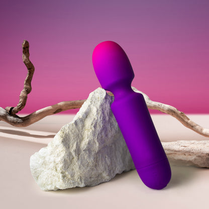 Purple Rocks Off GloGirl wand massager, a personal pleasure product with smooth finish.
