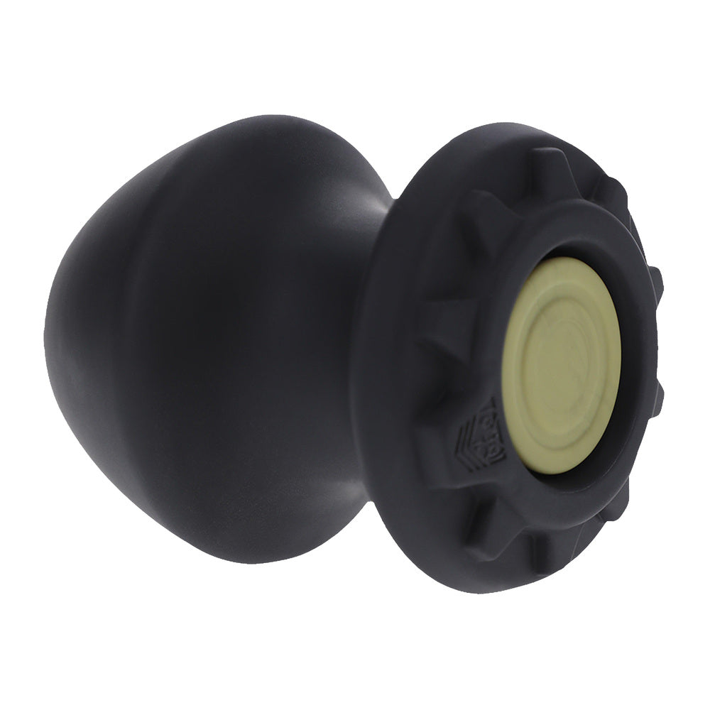 Black, medium-sized Doc Johnson Kum Keeper sex toy, designed with tunnel and stretcher features.