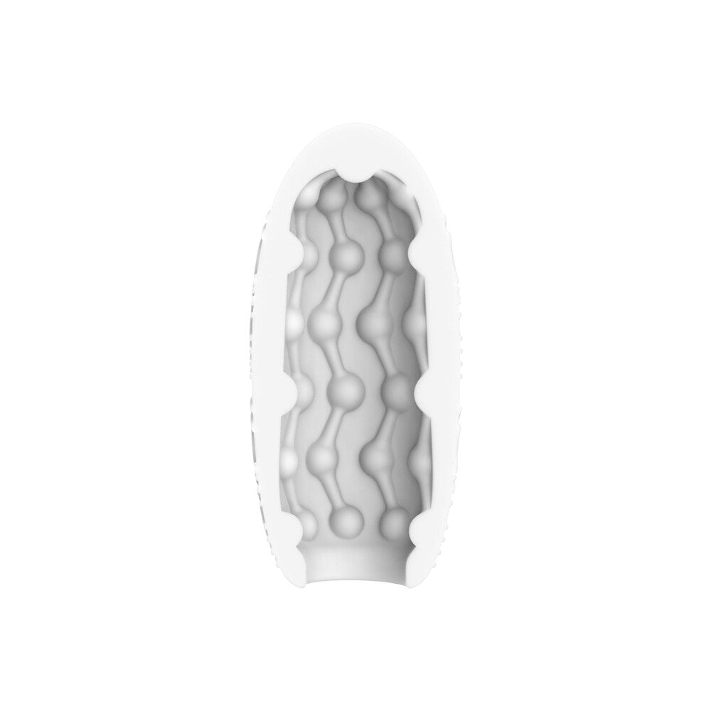 Close-up of three medium ToyJoy Hero masturbator rings in varying neutral colours.