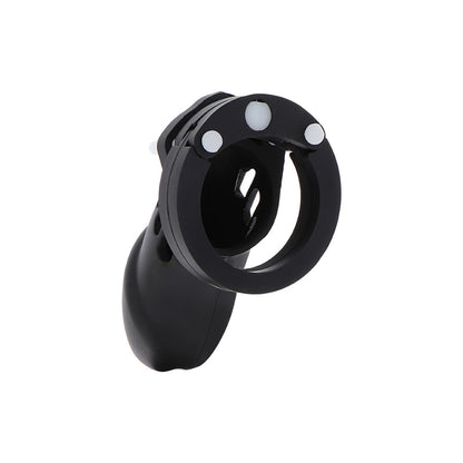 Hidden Desire extreme chastity device, a silicone cock cage in dark grey, used for male chastity.