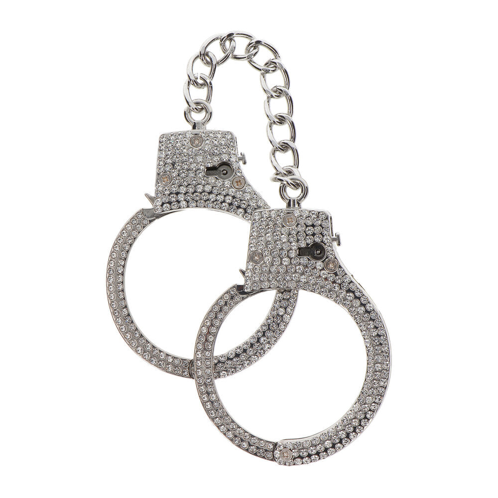 Close-up of sparkling diamond wrist cuffs; a luxurious and stylish accessory from Taboom.