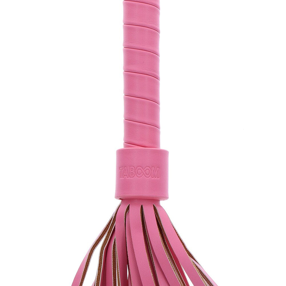 taboom malibu whip, a black faux leather flogger with multiple strands
