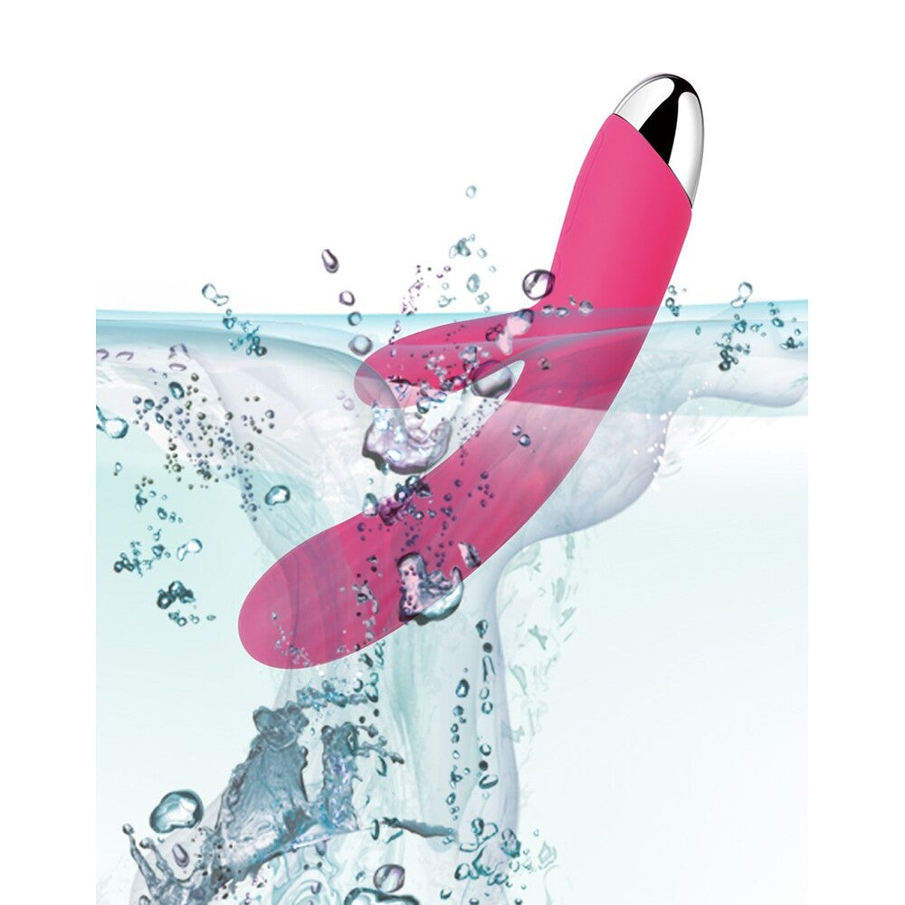 Svakom Angel vibrator with clit stimulator, warming function, shown in soft pink silicone.