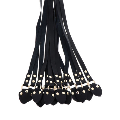 A black leather cato-nine whip, part of the masters collection from hidden desire.