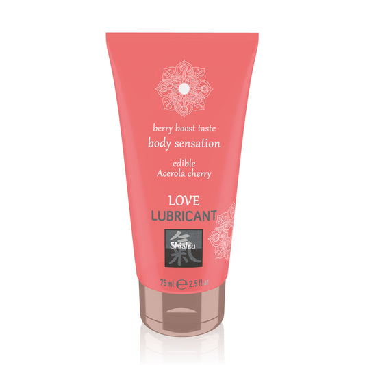A bottle of Shiatsu Love cherry flavour edible lubricant, in a pink box.