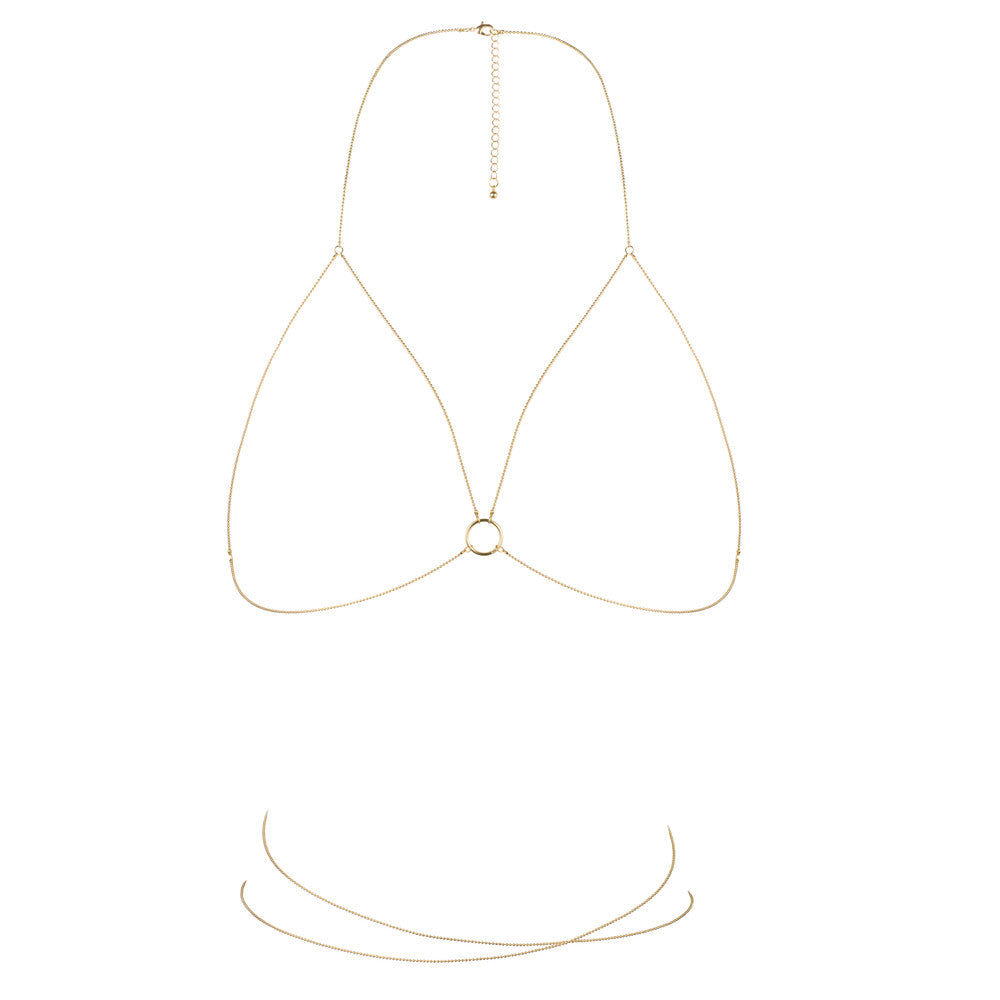 A gold-tone body chain with a bra-like design, a daring piece of body jewellery.