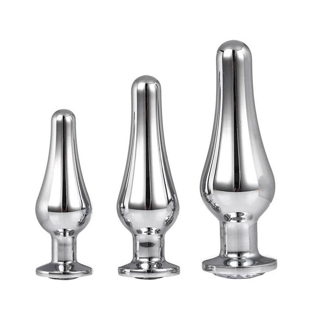 A set of three polished, silver-coloured jewelled butt plugs from Dream Toys, for anal play.