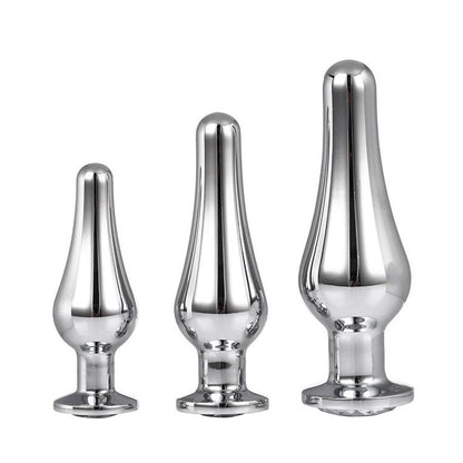 A set of three polished, silver-coloured jewelled butt plugs from Dream Toys, for anal play.