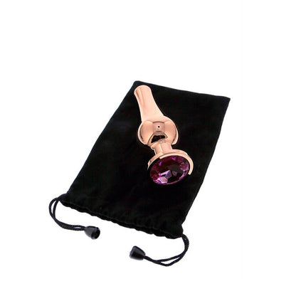 Rose gold jewelled butt plug set from dream toys, gleaming finish, boudoir style.