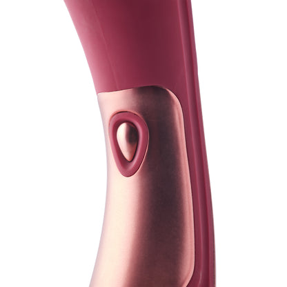 A small, curvy 'Dinky Jacky O' wand massager, designed for targeted pleasure and relaxation.
