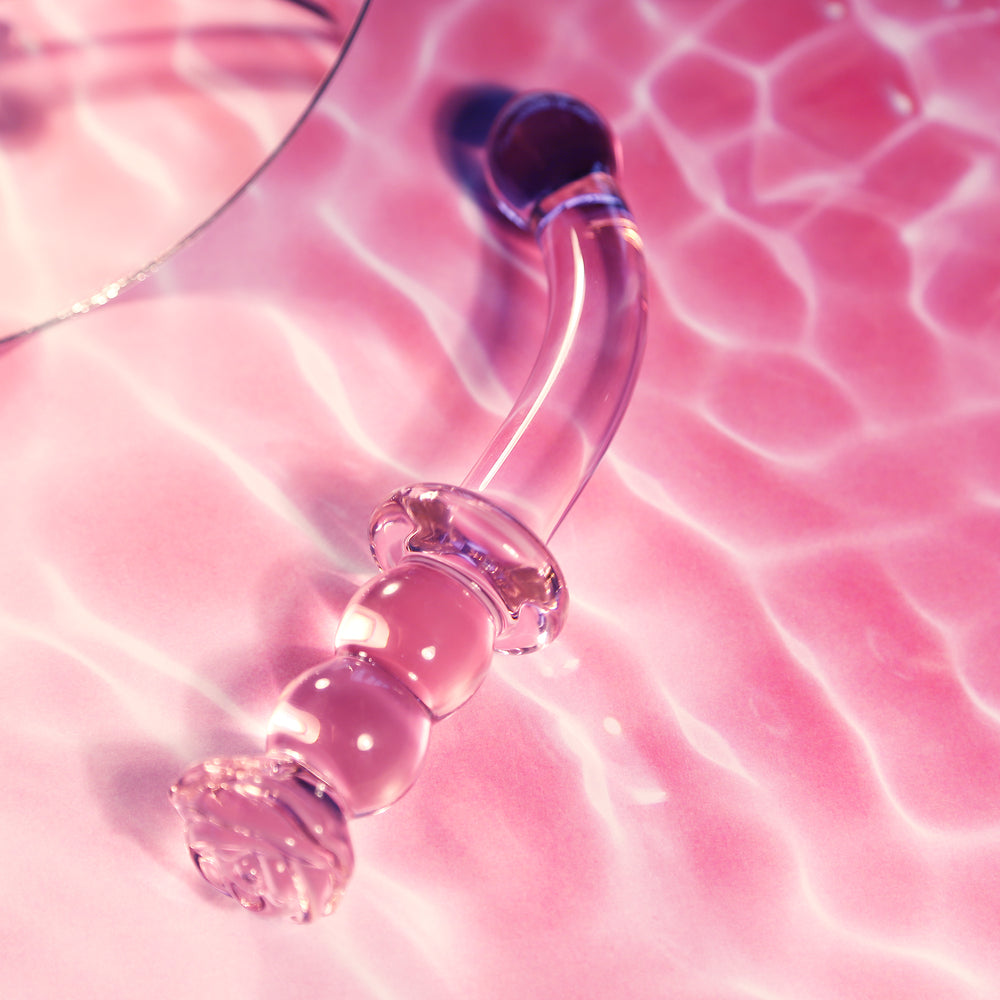 Glass rosebud dildo with a smooth, glossy glaze for g-spot stimulation.