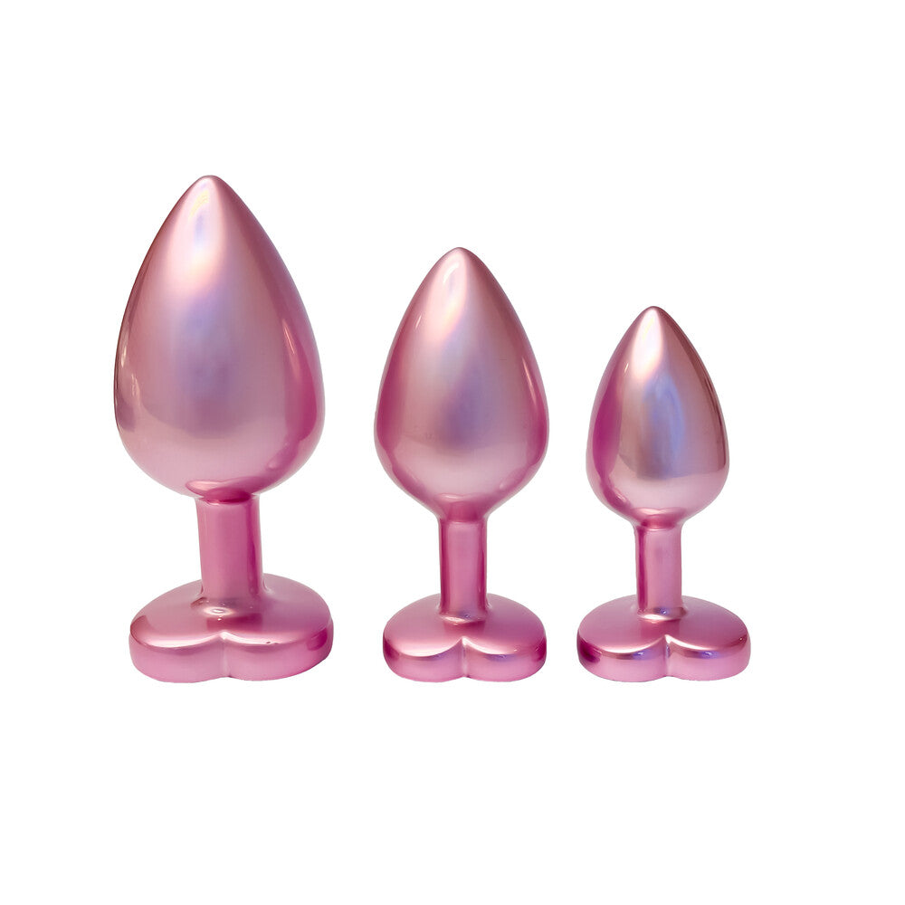 Dream Toys gleaming love pearl pink butt plug set, gradient sizes, smooth finish.