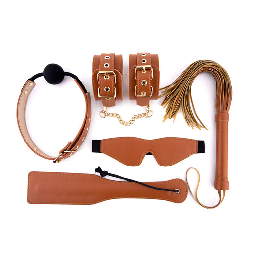 Dream Toys elite bdsm set in cognac vegan leather, a bondage kit for playful nights.