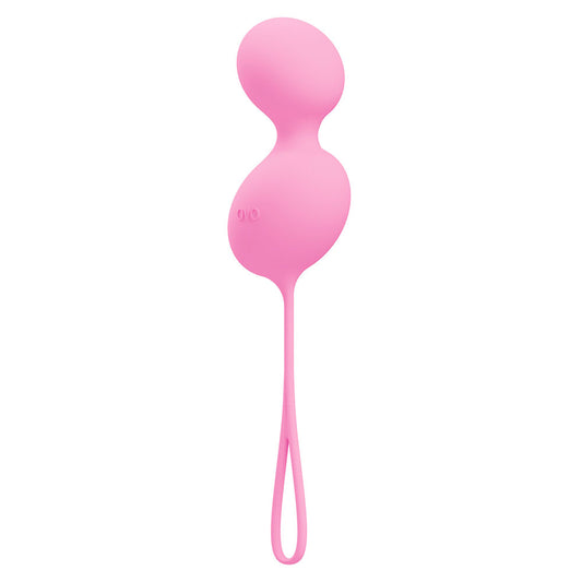 Close-up of pink ovo l3 love balls, smooth finish for intimate pleasure and pelvic floor exercise.