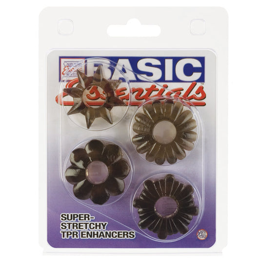 Close-up of four black silicone love rings from california exotic, basic essentials range.