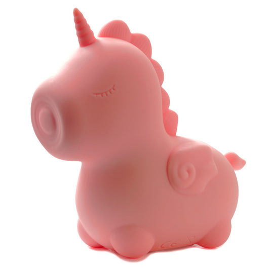 A pink, heart-shaped clitoral vibrator with a unicorn horn from Creative Conceptions.