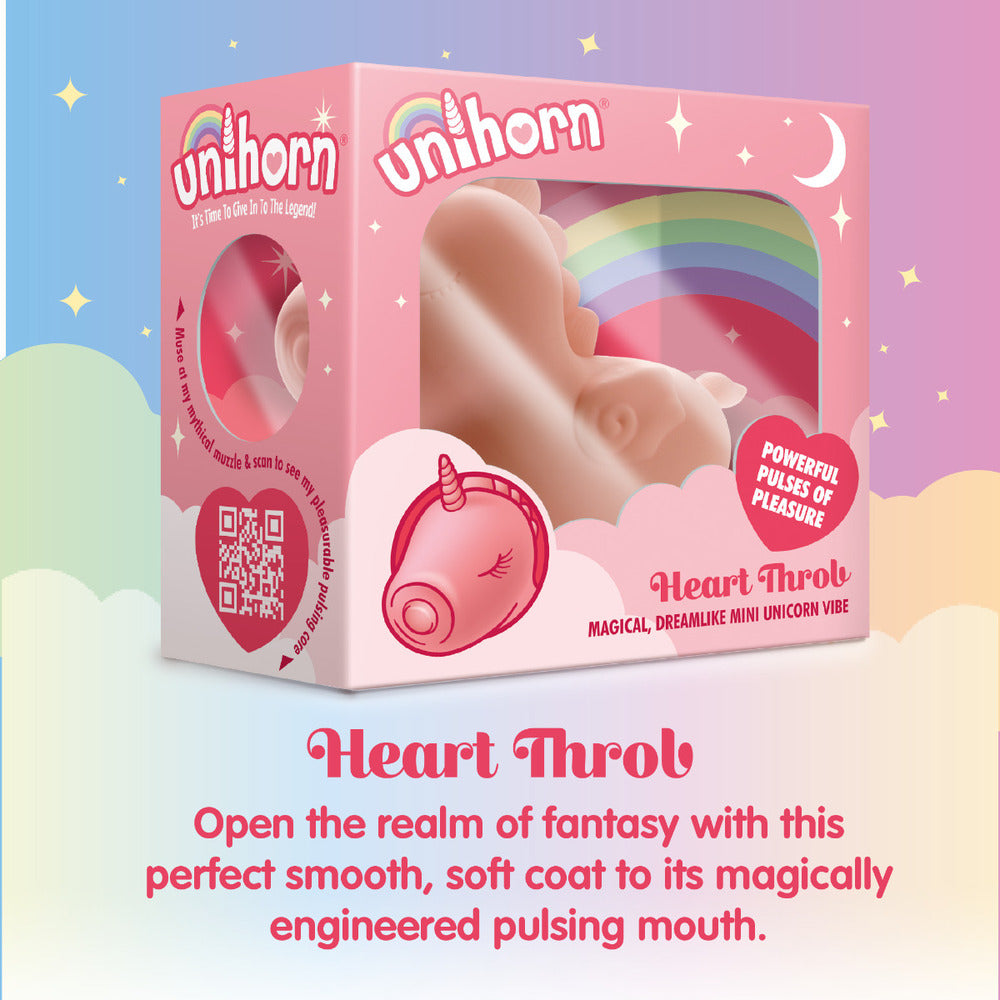 Heart-shaped clitoral vibrator in pearlescent white, by Creative Conceptions, for thrilling pleasure.