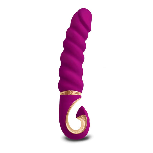 A small, smooth g-vibe vibrator in a vibrant colour, designed for targeted pleasure.