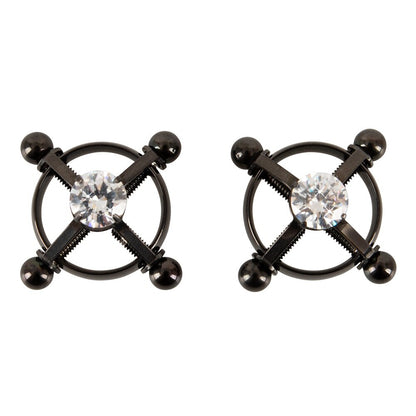 A pair of shiny, star-shaped nipple jewels for body adornment, perfect for adding some sparkle.
