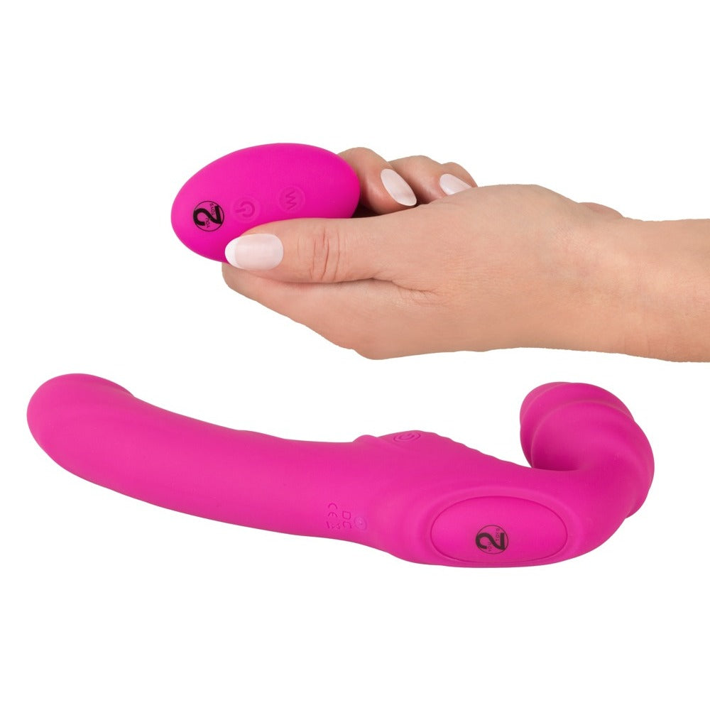 You2Toys vibrating strapless strap-on in a realistic flesh tone with smooth finish.