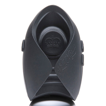 Pulse Solo essential guybrator masturbator in dark grey with ribbed texture and charging plate.
