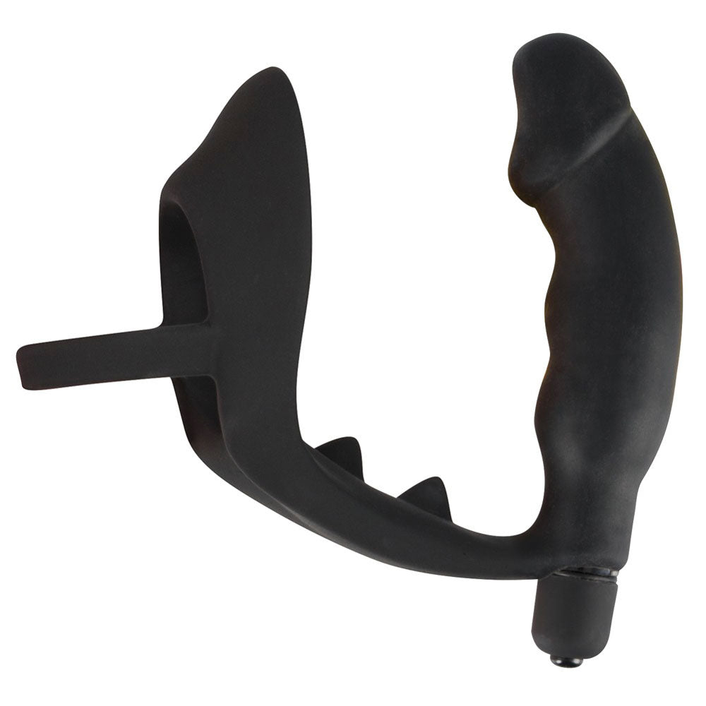 A black velvet cock ring paired with a vibrating anal plug for prostate massage.