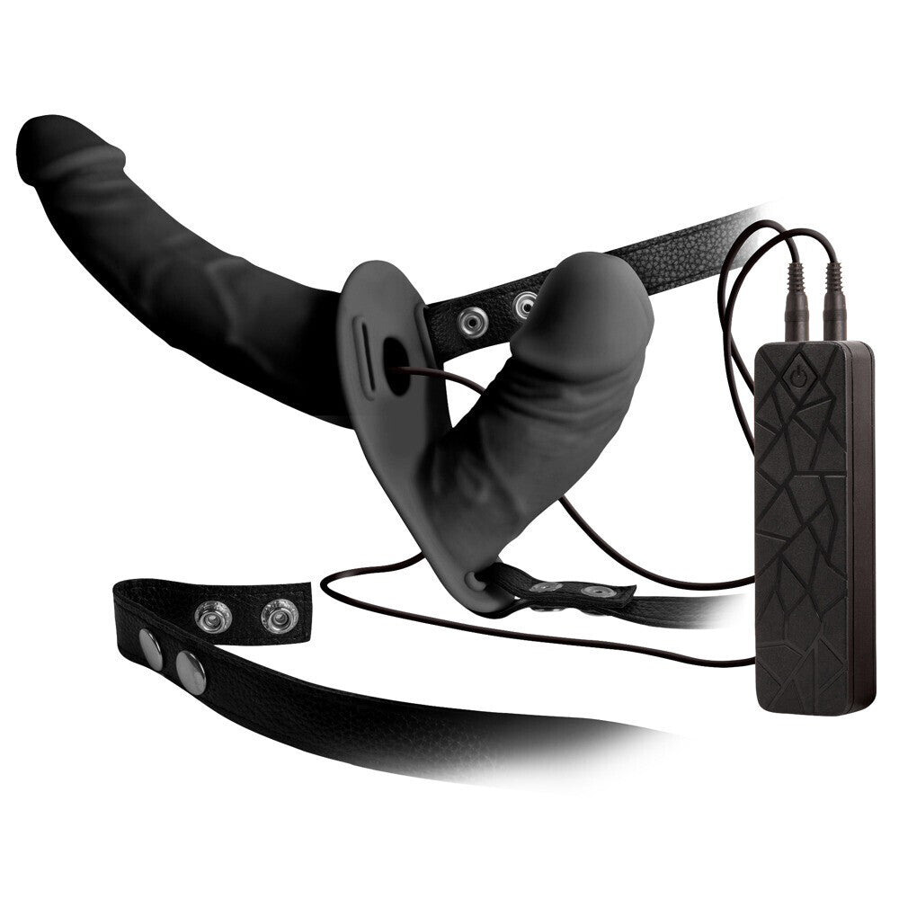 Double-ended vibrating dildo with harness, a versatile strap-on toy for partnered pleasure.