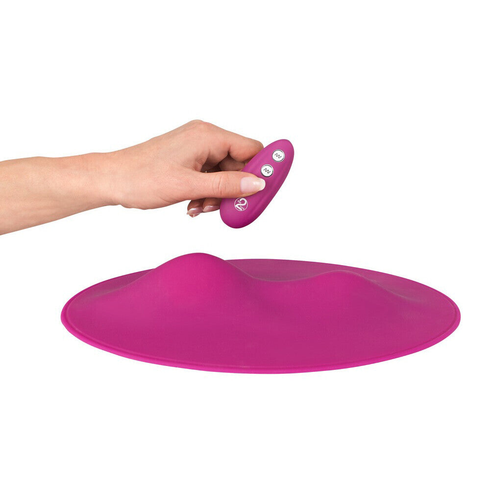 Various Toy Brands vibe pad vibrator in purple; a textured, disc-shaped pleasure toy.