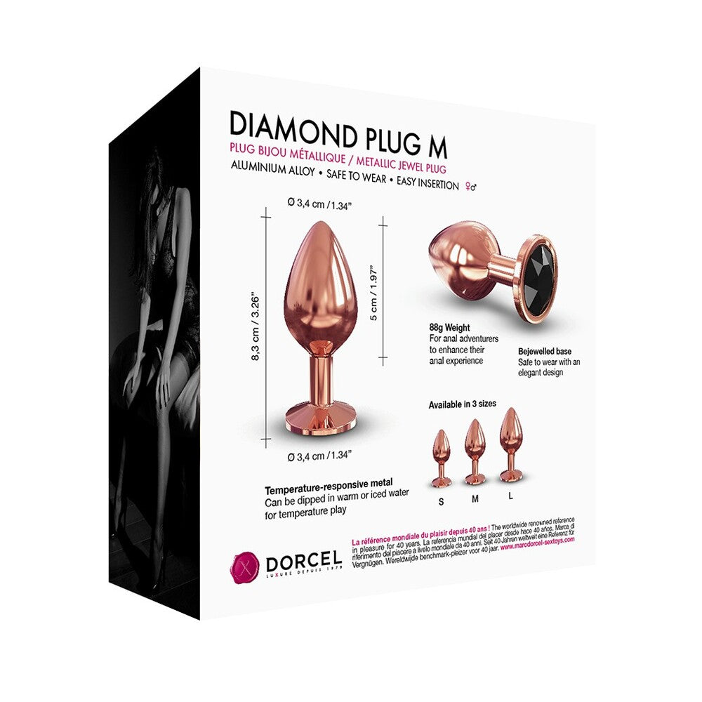 Rose gold coloured, medium-sized butt plug with a clear diamond-shaped gem on the end.
