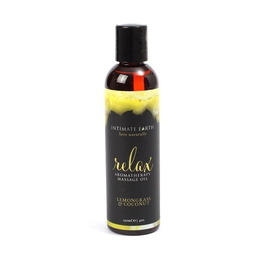 Bottle of intimate earth lemongrass and coconut massage oil for bath and massage.