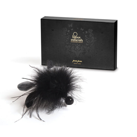 Bijoux Indiscrets feather tickler with a fluffy pom pom in a playful accessory.