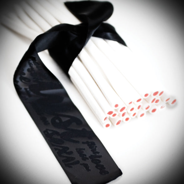 Silky black handcuffs with a luxurious finish, perfect for sensual play and exploration.