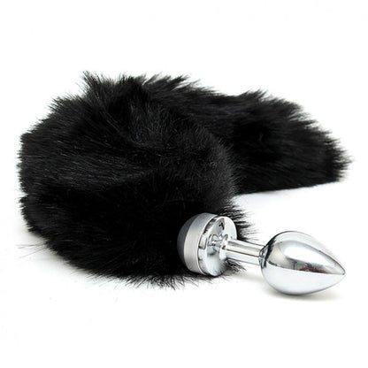 Rimba small butt plug with a fluffy black animal tail attached, a cheeky pleasure toy.