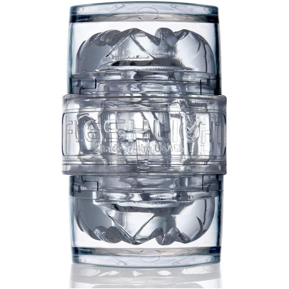 Clear Fleshlight Quickshot Vantage masturbator showing its translucent, ergonomic design, ready for solo pleasure.