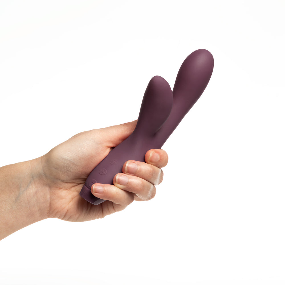 Sleek purple rabbit vibrator by je joue, a luxurious pleasure toy with bunny ears.