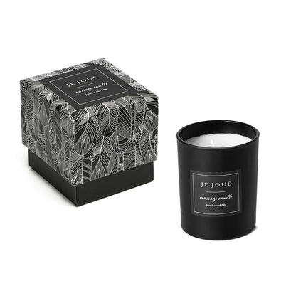 Je Joue jasmine and lily massage candle in an elegant glass jar, perfect for a relaxing bath and massage.