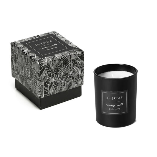 Je Joue jasmine and lily massage candle in an elegant glass jar, perfect for a relaxing bath and massage.