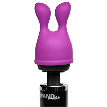 Close-up of a smooth, rounded wand massager attachment, possibly silicone, in a neutral tone.