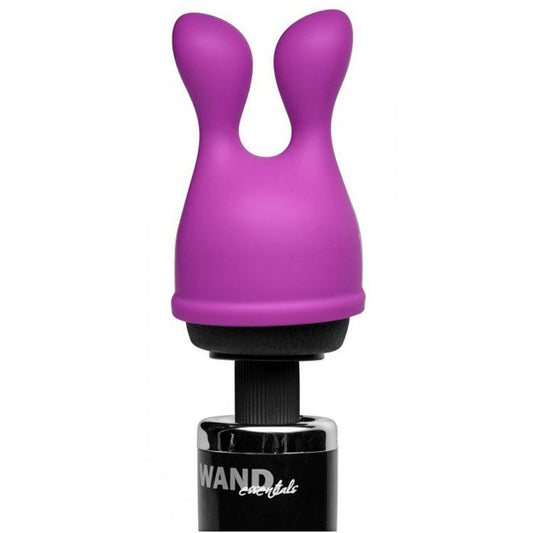 Close-up of a smooth, rounded wand massager attachment, possibly silicone, in a neutral tone.