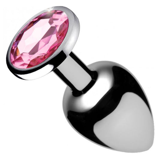 Pink gem-encrusted medium sized anal plug for butt play, adding a sparkly touch.