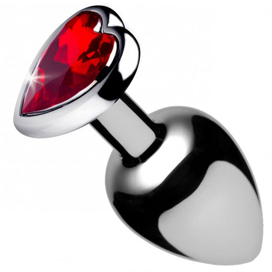 A medium sized red, heart-shaped anal plug with a glossy finish, for kinky fun.