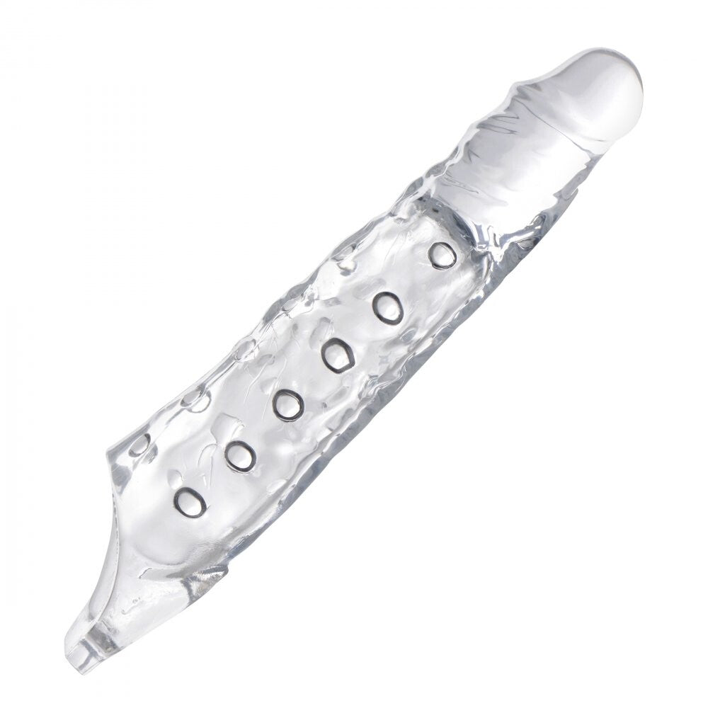 Close-up of a three inch clear penis extender sleeve, made of smooth, flexible material.