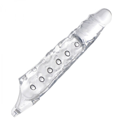 Close-up of a three inch clear penis extender sleeve, made of smooth, flexible material.