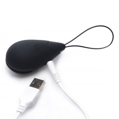 A black, vibrating silicone egg from xr brands, a pleasure toy for discreet stimulation.